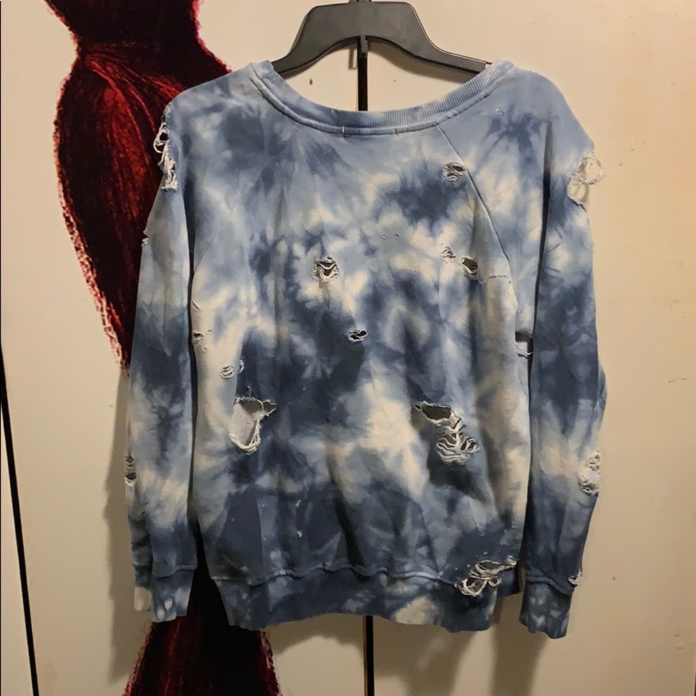 Distressed sweater